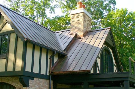 metal roof on tudor house|tudor style roof upgrades.